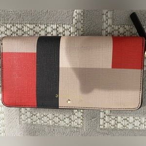 Kate spade wallet. Good condition. A small mark in the back